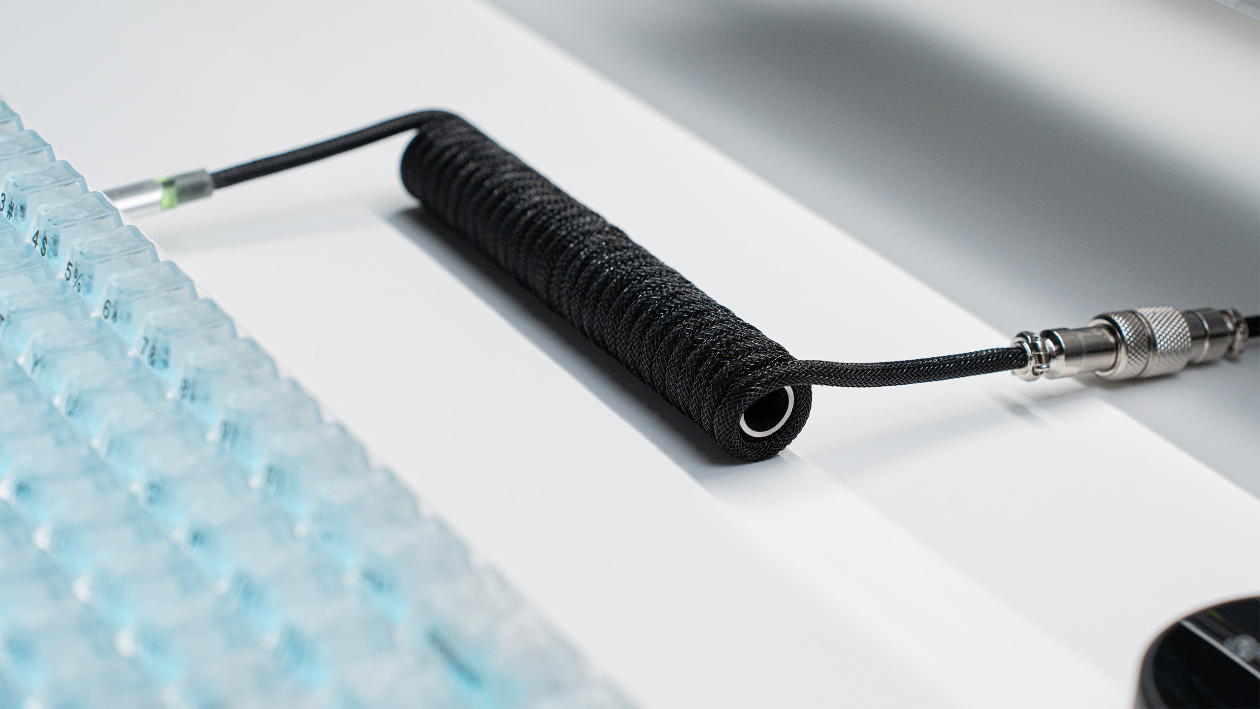 Black coiled ATTACK SHARK C01ULTIMATE cable with metal connector for magnetic keyboard